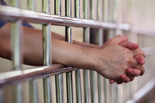 45332958 - hand in jail